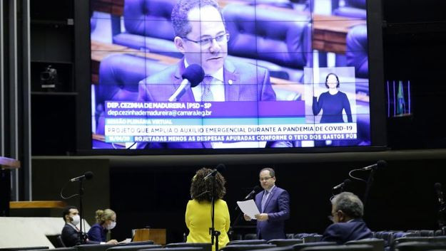 Imagem 1 -  Os deputados federais aprovaram as mudanças na proposta do auxílio emergencial do Governo Federal nesta quinta-feira (16) e ampliaram os grupos atendidos pelo auxílio. Diversos trabalhadores foram incluídos no benefício, entre eles pescadores profissionais e artesanais, agricultores, taxistas, motoristas de aplicativo e pipoqueiros; Com as mudanças, a proposta volta para votação no Senado.