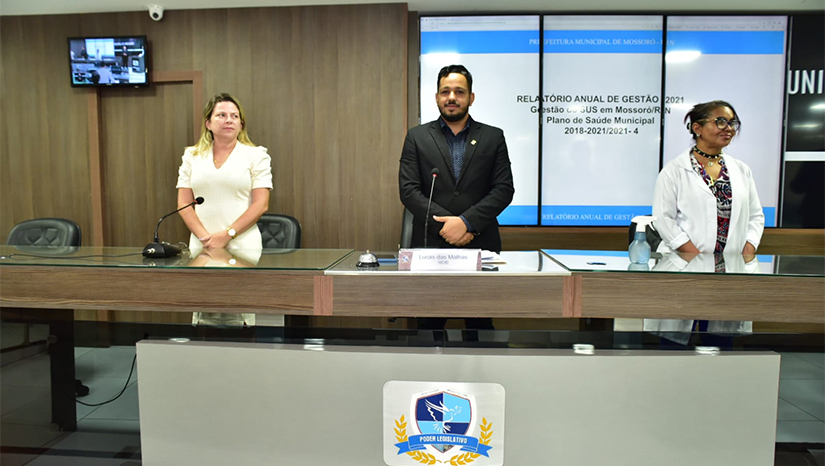 Imagem 1 - A secretaria de saúde, Morgana Dantas participou nesta quinta-feira (27), na Câmara Municipal de Vereadores da audiência pública para prestação de contas das ações da saúde do município. Ela avaliou 2021 como ano de reestruturação, mas apontou avanços nos primeiros 12 meses. “Um ano de muitos desafios, início de gestão, encontramos a rede em situação muito difícil, além da pandemia de Covid-19. Mas, com muito trabalho, conquistamos avanços, como inauguração de duas Unidades Básicas de Saúde”, disse Morgana. Ela acrescentou outras conquistas na rede municipal de Saúde, como a disponibilidade de neuropediatras, reforço de médicos em UBSs. “Experimentamos avanços em 2021, na confiança que, em 2022, realizaremos muitas outras ações em Mossoró”, afirmou. Imagem 1 - A secretaria de saúde, Morgana Dantas participou nesta quinta-feira (27), na Câmara Municipal de Vereadores da audiência pública para prestação de contas das ações da saúde do município. Ela avaliou 2021 como ano de reestruturação, mas apontou avanços nos primeiros 12 meses. “Um ano de muitos desafios, início de gestão, encontramos a rede em situação muito difícil, além da pandemia de Covid-19. Mas, com muito trabalho, conquistamos avanços, como inauguração de duas Unidades Básicas de Saúde”, disse Morgana. Ela acrescentou outras conquistas na rede municipal de Saúde, como a disponibilidade de neuropediatras, reforço de médicos em UBSs. “Experimentamos avanços em 2021, na confiança que, em 2022, realizaremos muitas outras ações em Mossoró”, afirmou.