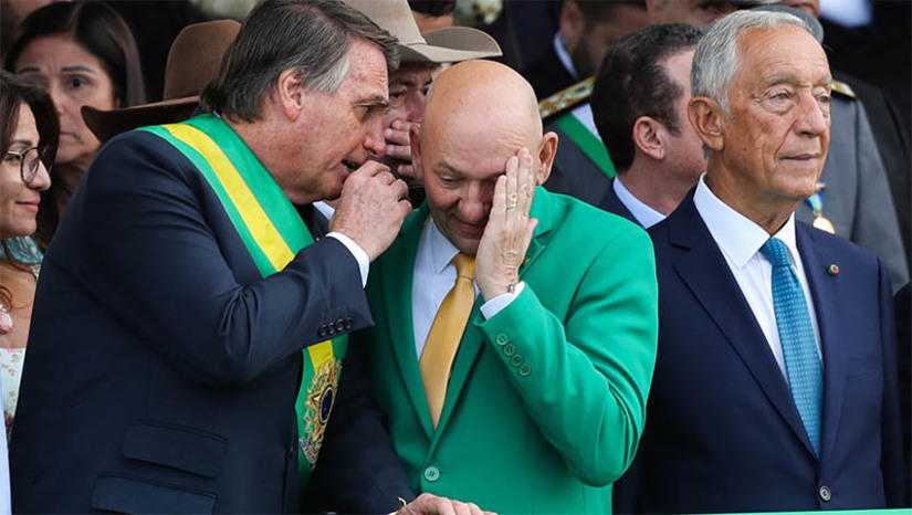Imagem 1 -  [COLUNA ESPLANADA] Em plena comemoração dos 200 anos da Independência do Brasil, foi tão fria a relação do presidente Jair Bolsonaro com o convidado Marcelo Rebelo, presidente de Portugal, a ponto de lembrar a tensa relação da Coroa com o Brasil imperial. O cerimonial de Bolsonaro cometeu a gafe de deixar o empresário Luciano Hang, da Havan, ao lado do presidente – ofuscando assim a presença do convidado ilustre. O ‘véio da Havan’ teve mais atenção que o convidado ilustre. Bolsonaro e Rebelo mal se falaram. Ao fim do dia, a Embaixada de Portugal promoveu uma recepção comemorativa para cidadãos portugueses e brasileiros com cidadania, com a presença do chefe de Estado europeu. Nenhuma autoridade do Palácio do Planalto apareceu. O clima já não estava bom entre os dois presidentes desde que, há dois meses, Bolsonaro desmarcou uma reunião entre eles, a convite do brasileiro, porque Rebelo se reuniu com Lula da Silva.
