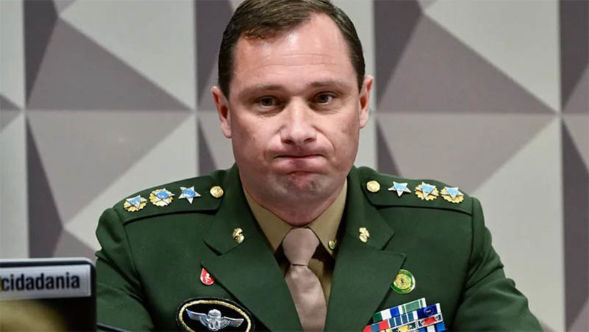 Imagem 1 -  [COLUNA ESPLANADA] O script do noticiário abriu crise velada entre altos oficiais das três Forças Armadas. O vazamento das supostas informações na delação do tenente-coronel Mauro Cid de que o então comandante da Marinha Almir Garnier teria topado golpe militar com o presidente Jair Bolsonaro, numa reunião na transição, caiu como bomba entre militares, mas com diferentes efeitos. Uma parte considera graves acusações, se comprovadas – Cid terá de entregar as provas, garante quem circula no STF. Outra ala vê com muita cautela. Acha muito estranho Cid, oficial de baixa patente, presenciar suposta reunião do Comando. Considera que o delator estava ansioso para se livrar da cadeia, em pré-depressão, e informações verbais têm de ser analisadas sem sensacionalismo. Há quem aponte que o Exército, com generais ligados a Bolsonaro e com “filme queimado” na praça, quer se livrar e usa Cid, um dos seus, para culpar o almirante.