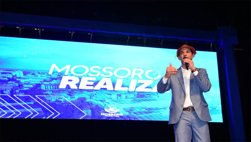 Imagem 1 - Allyson convida a população para o lançamento da 2ª fase do Mossoró Realiza. O evento ocorrerá na próxima segunda-feira (27), na Rua Benício Filho, no grande Alto de São Manoel, a partir das 16h30, onde o prefeito de Mossoró anunciará que abrangem diversas áreas e contemplará tanto a Zona Urbana quanto a Rural. Segundo o gestor, serão anunciados mais de R$ 80 milhões de investimentos em obras, incluindo a duplicação das pontes da Avenida Presidente Dutra, no Alto de São Manoel. Imagem 1 - Allyson convida a população para o lançamento da 2ª fase do Mossoró Realiza. O evento ocorrerá na próxima segunda-feira (27), na Rua Benício Filho, no grande Alto de São Manoel, a partir das 16h30, onde o prefeito de Mossoró anunciará que abrangem diversas áreas e contemplará tanto a Zona Urbana quanto a Rural. Segundo o gestor, serão anunciados mais de R$ 80 milhões de investimentos em obras, incluindo a duplicação das pontes da Avenida Presidente Dutra, no Alto de São Manoel.