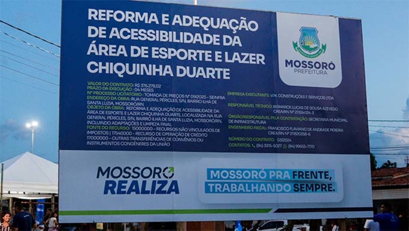 Imagem 1 - Será a primeira grande revitalização no espaço em mais de 20 anos. A estruturação do equipamento será efetivada a partir de investimentos do programa “Mossoró Realiza”. A reforma da praça contempla a revitalização da quadra esportiva, alambrado em todo o seu perímetro e rede de proteção, academia da primeira idade, academia da terceira idade, uma área de 1.074,00 m² de passeio em intertravado, bancos de concreto, Iluminação em LED e paisagismo. Imagem 1 - Será a primeira grande revitalização no espaço em mais de 20 anos. A estruturação do equipamento será efetivada a partir de investimentos do programa “Mossoró Realiza”. A reforma da praça contempla a revitalização da quadra esportiva, alambrado em todo o seu perímetro e rede de proteção, academia da primeira idade, academia da terceira idade, uma área de 1.074,00 m² de passeio em intertravado, bancos de concreto, Iluminação em LED e paisagismo.