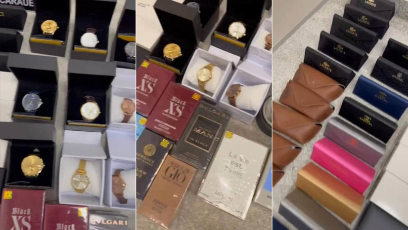 Imagem 1 - Casal de portugueses é autuado e produtos falsificadas são apreendidos em Caraúbas. Com o casal, um homem de 24 anos e uma mulher de 19 anos, a polícia civil apreendeu 33 óculos de sol, 10 perfumes, 5 canetas, 8 bolsas e 12 relógios, todos ostentando marcas famosas internacionais, mas sem apresentação de notas fiscais que comprovassem sua origem e autenticidade. As investigações prosseguirão para determinar a origem dos produtos e para realizar perícias que possam fornecer evidências adicionais sobre o esquema ilícito. Imagem 1 - Casal de portugueses é autuado e produtos falsificadas são apreendidos em Caraúbas. Com o casal, um homem de 24 anos e uma mulher de 19 anos, a polícia civil apreendeu 33 óculos de sol, 10 perfumes, 5 canetas, 8 bolsas e 12 relógios, todos ostentando marcas famosas internacionais, mas sem apresentação de notas fiscais que comprovassem sua origem e autenticidade. As investigações prosseguirão para determinar a origem dos produtos e para realizar perícias que possam fornecer evidências adicionais sobre o esquema ilícito.