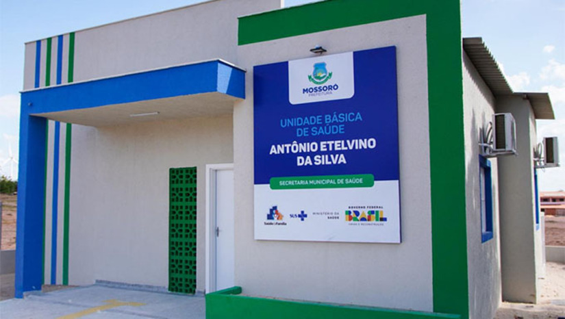 Imagem 1 - A UBS Antônio Etelvino da Silva, localizada na comunidade Favela, zona rural de Mossoró, será a 9ª UBS da rural entregue pela Prefeitura de Mossoró. O equipamento proporcionará mais saúde e qualidade de vida à população com oferta de serviços na Atenção Primária. A UBS ofertará atendimentos básicos nas áreas de Clínica Geral, Enfermagem e Odontologia. Além disso, consultas médicas, inalações, injeções, curativos, vacinas, coleta de exames laboratoriais, tratamento odontológico, fornecimento de medicação e encaminhamentos para outras especialidades. Imagem 1 - A UBS Antônio Etelvino da Silva, localizada na comunidade Favela, zona rural de Mossoró, será a 9ª UBS da rural entregue pela Prefeitura de Mossoró. O equipamento proporcionará mais saúde e qualidade de vida à população com oferta de serviços na Atenção Primária. A UBS ofertará atendimentos básicos nas áreas de Clínica Geral, Enfermagem e Odontologia. Além disso, consultas médicas, inalações, injeções, curativos, vacinas, coleta de exames laboratoriais, tratamento odontológico, fornecimento de medicação e encaminhamentos para outras especialidades.