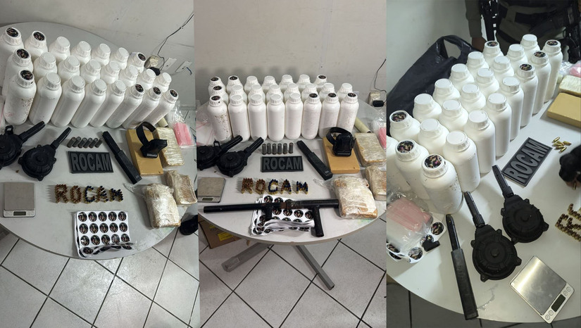 Imagem 1 - Ação contra facções resulta em apreensão de R$ 100 mil em drogas em Mossoró (RN). Uma operação de agentes da Rocam do 2º Batalhão da Polícia Militar localizou um depósito de entorpecentes e armamentos em um imóvel abandonado no bairro Barrocas. A ação começou após denúncias apontarem que um homem de 26 anos sob monitoramento eletrônico usava o local para esconder o material ilícito. Uma tornozeleira rompida foi recolhida na residência e o suspeito, que fugiu para o bairro Redenção, é procurado pela Polícia Civil. Imagem 1 - Ação contra facções resulta em apreensão de R$ 100 mil em drogas em Mossoró (RN). Uma operação de agentes da Rocam do 2º Batalhão da Polícia Militar localizou um depósito de entorpecentes e armamentos em um imóvel abandonado no bairro Barrocas. A ação começou após denúncias apontarem que um homem de 26 anos sob monitoramento eletrônico usava o local para esconder o material ilícito. Uma tornozeleira rompida foi recolhida na residência e o suspeito, que fugiu para o bairro Redenção, é procurado pela Polícia Civil.